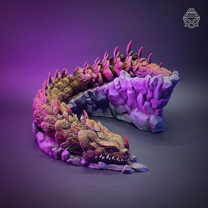 Referans görsel — Caicai ve Trentren Vilu — Oynar Eklemli Yılan İkilisi. Wefty Design'in kendi baskısının fotoğrafı değildir.
