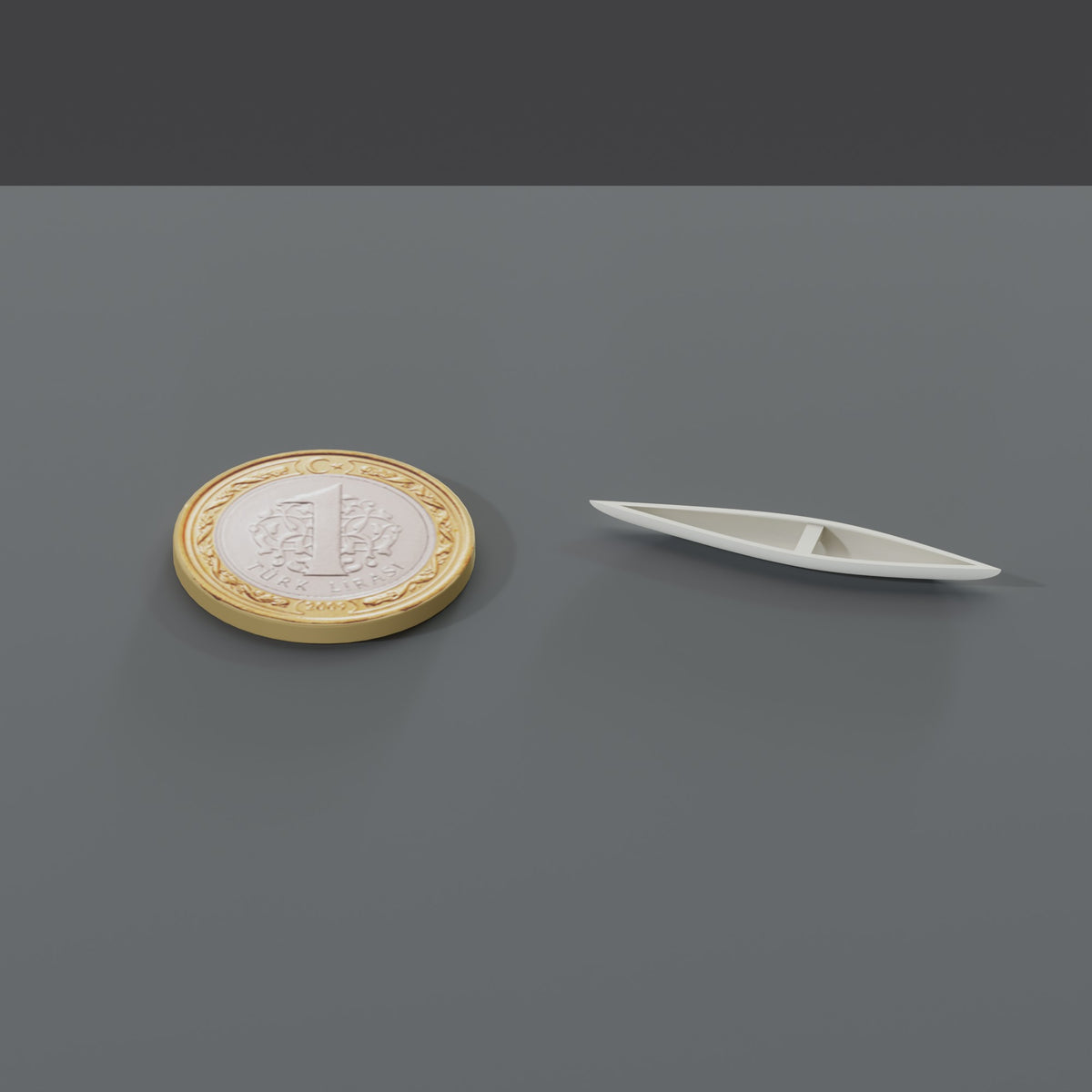 Minyatür Kano No.37 — ölçekli render: 1 TL madeni paranın yanında XL boy (37 mm)